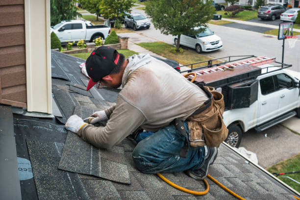 Professional Roofing technician working in Belle, MO
